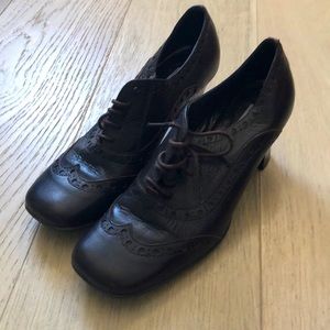 Brown leather square toe heel.